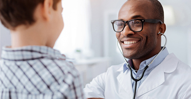 Young Boy Visits Doctor A Part Of A Facilitated Health Network