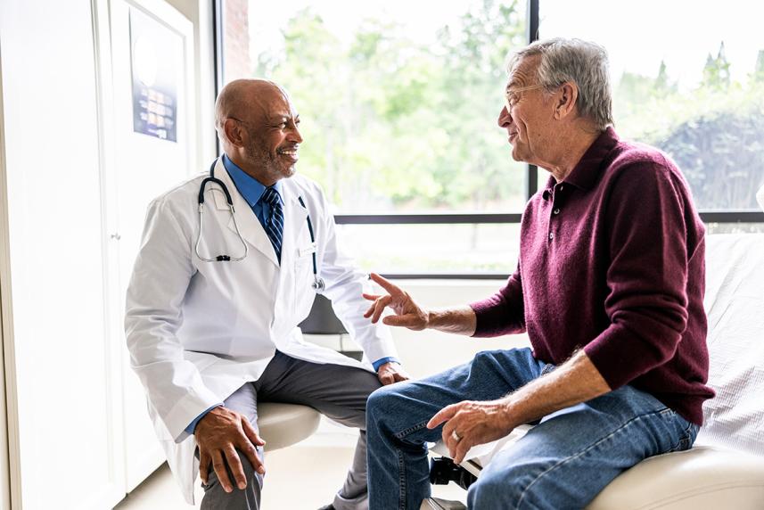 Man talking to doctor