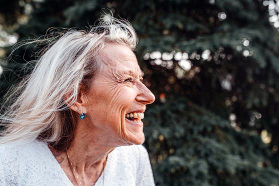 Woman smiling.