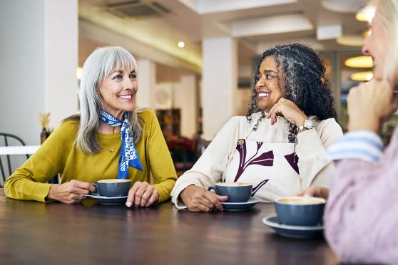 Group of women having coffee together.