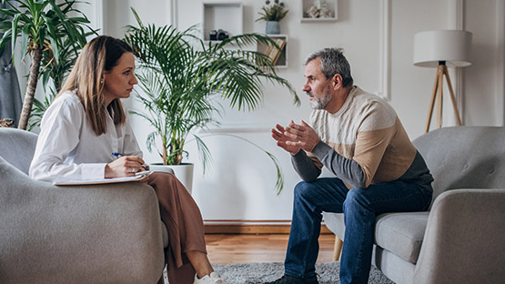 A man talks with his therapist